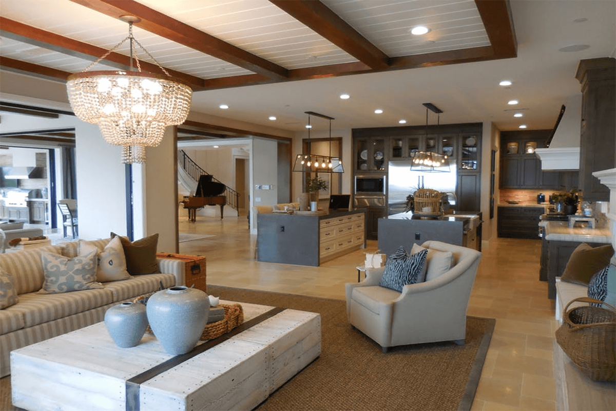 Modern white house with glass windows and pool.