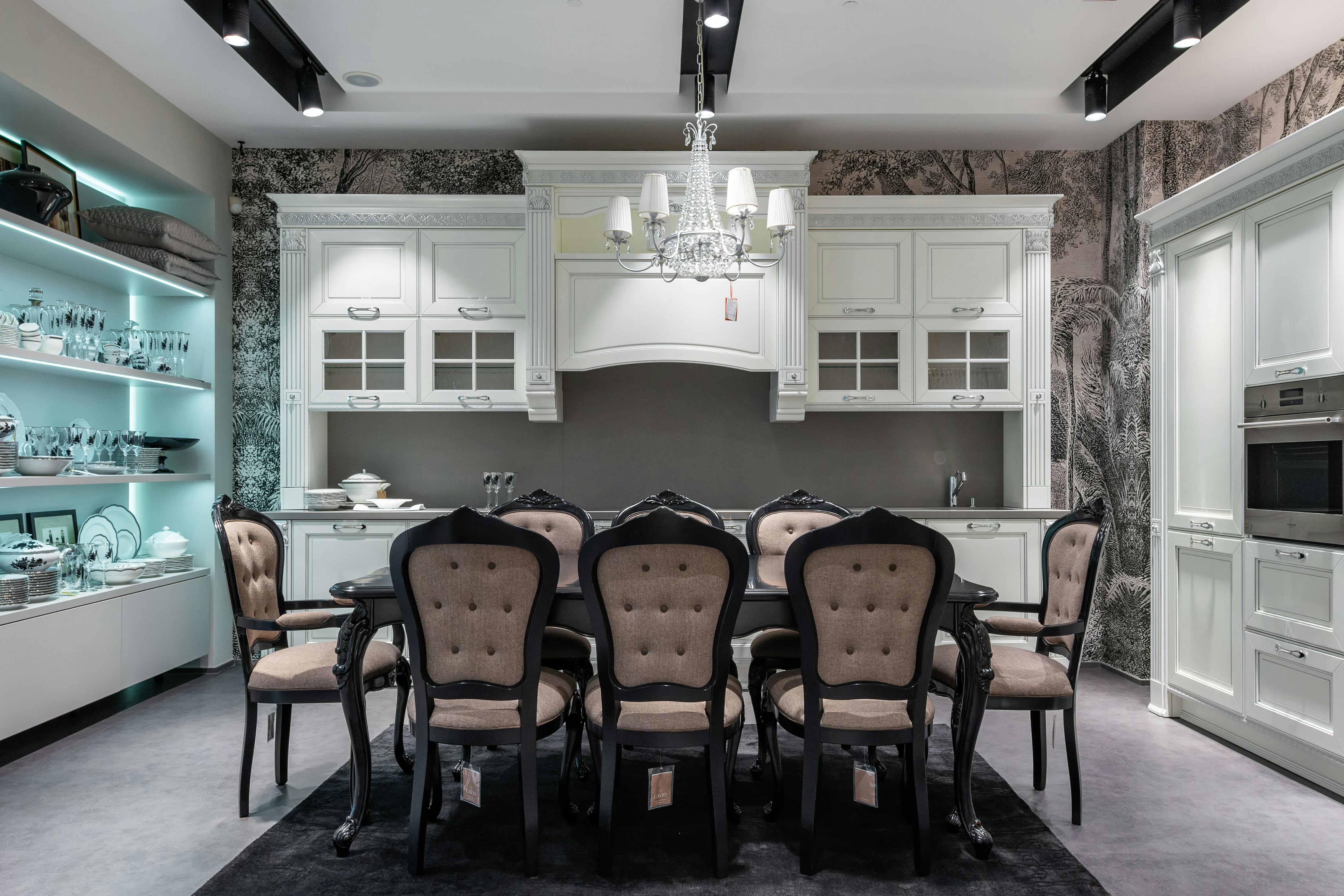 Classic dining set with upholstered chairs in a white traditional kitchen